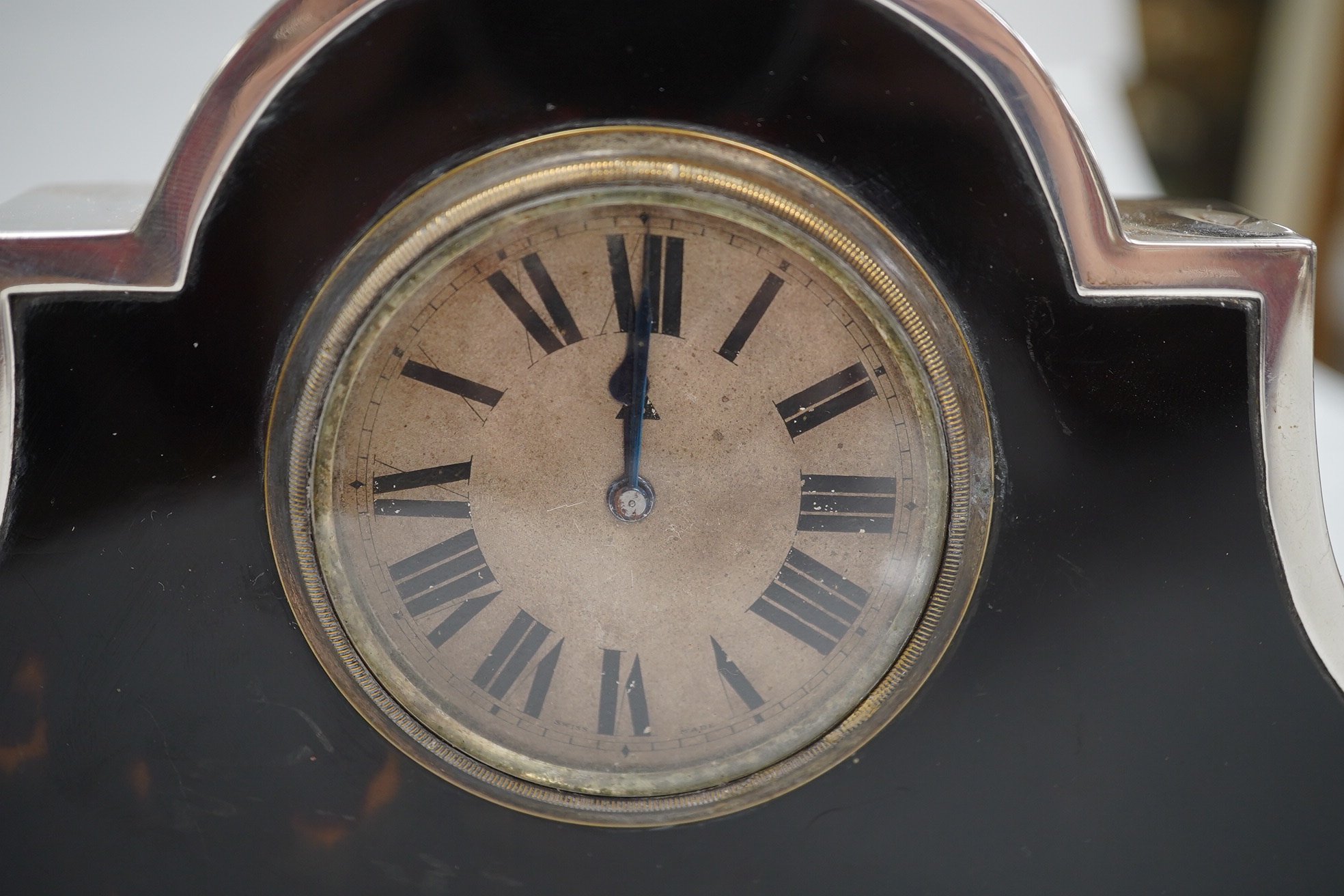 A George V silver and tortoiseshell mounted mantel timepiece, on bun feet, Horton & Allday, Birmingham, 1920, 20.6cm width. Condition - fair to good (not currently running).